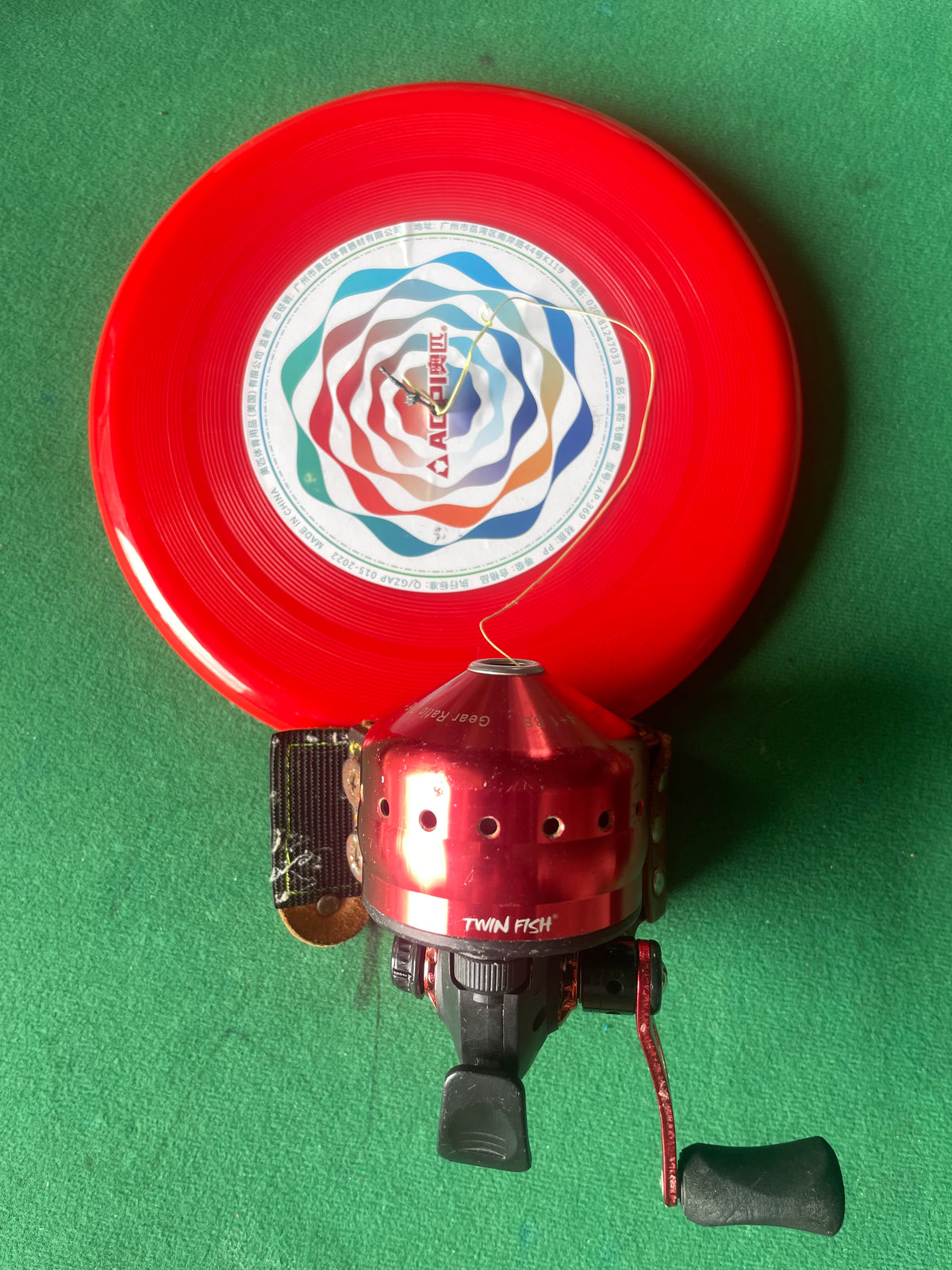 Flying disc fish wheel